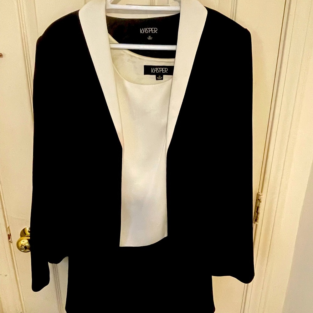 Three piece suit : jacket, pencil skirt and top with the side zipper.